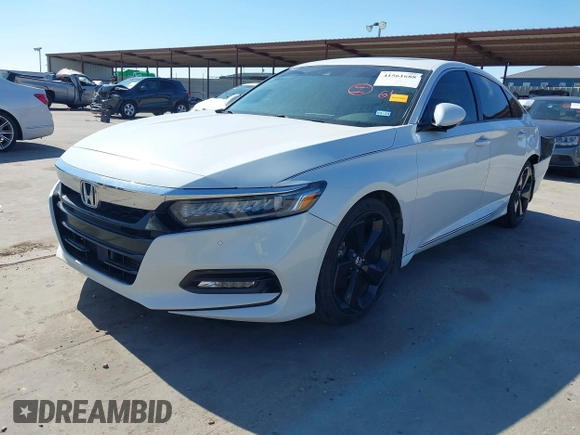 2018 Honda Accord Touring z VIN 1HGCV1F96JA144076, wystawiony jako IAAI lot #41561688 z przebiegiem 125 539 mil mil oraz . Historia ofert i sprzedaży dostępna na DreamBid. Obrazek 2.