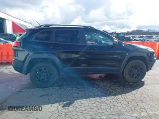 2015 Jeep Cherokee Trailhawk with VIN 1C4PJMBS7FW699392, listed as a IAAI auction lot 41797617 with 1 mi miles. Bid and sale history available at carsss.com. Image 13.