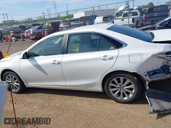 2015 Toyota Camry XLE with VIN 4T1BF1FK1FU977554, listed as a IAAI auction lot 42083589 with 104,811 mi miles and . Bid and sale history available at DreamBid. Image 15.