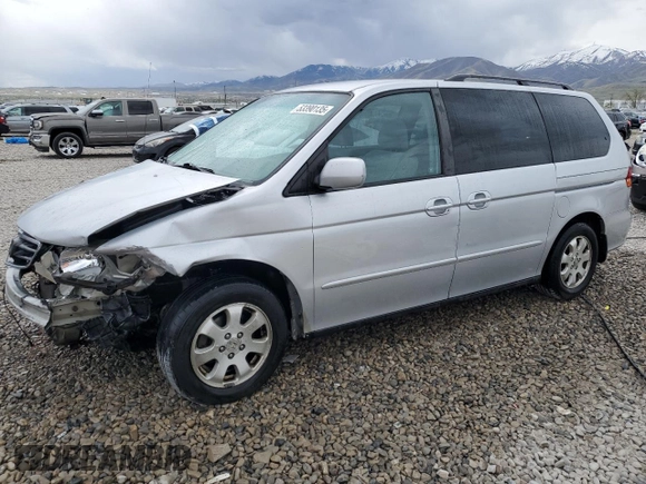 2004 Honda Odyssey EX-RES z VIN 5FNRL18804B121844, wystawiony jako Copart lot #53390135 z przebiegiem 284 065 mil mil oraz Szkoda całkowita • Salvage title. Historia ofert i sprzedaży dostępna na DreamBid. Obrazek 1.