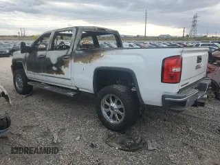 2018 GMC Sierra 2500HD SLT z VIN 1GT12TEY1JF108589, wystawiony jako Copart lot #52713975 z przebiegiem Nie podano mil oraz Nie do naprawy • Non repairable. Historia ofert i sprzedaży dostępna na DreamBid. Obrazek 2.