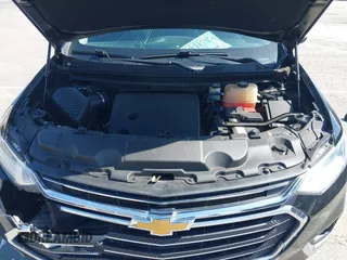 2021 Chevrolet Traverse LT Cloth with VIN 1GNERGKW9MJ162089, listed as a IAAI auction lot 41944248 with 99,586 mi miles. Bid and sale history available at carsss.com. Image 10.