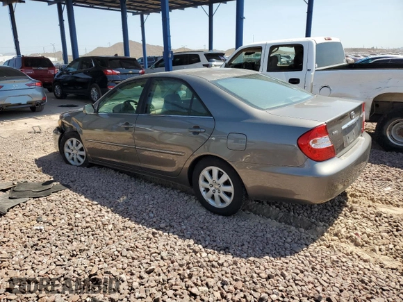 2004 Toyota Camry LE with VIN 4T1BF30K24U569209, listed as a Copart auction lot 66181644 with 186,412 mi miles and Salvage Title. Bid and sale history available at carsss.com. Image 2.