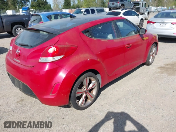 2012 Hyundai Veloster w/Black Int z VIN KMHTC6AD4CU077164, wystawiony jako IAAI lot #42053970 z przebiegiem 122 657 mil mil oraz . Historia ofert i sprzedaży dostępna na DreamBid. Obrazek 4.