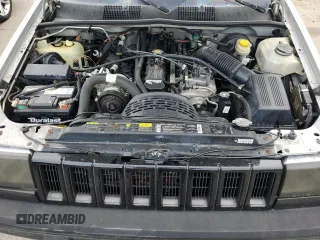 1995 Jeep Grand Cherokee Laredo with VIN 1J4GZ58S2SC703196, listed as a Copart auction lot 68571944 with 264,876 mi miles and Clean Title. Bid and sale history available at carsss.com. Image 12.