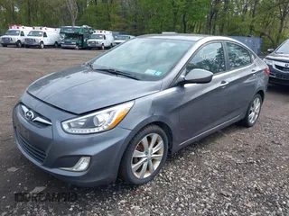 2014 Hyundai Accent GLS with VIN KMHCU4AE9EU761298, listed as a IAAI auction lot 42186032 with 118,848 mi miles and . Bid and sale history available at carsss.com. Image 2.