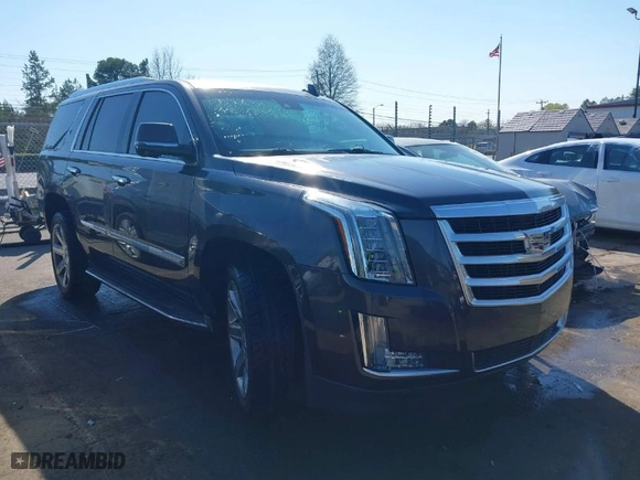 2015 Cadillac Escalade Luxury with VIN 1GYS3MKJ2FR518865, listed as a IAAI auction lot 41890235 with 156,849 mi miles. Bid and sale history available at carsss.com. Image 1.