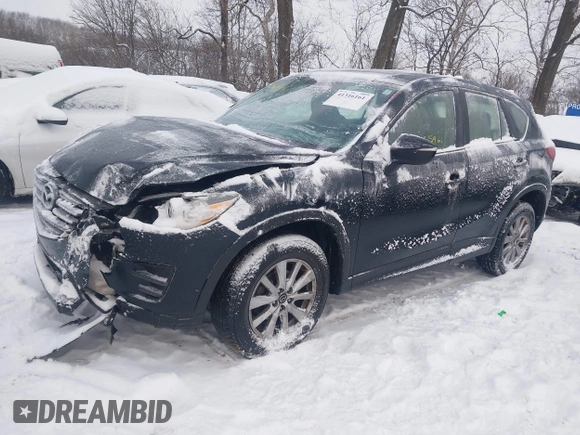 2016 Mazda CX-5 Sport z VIN JM3KE4BY0G0919017, wystawiony jako IAAI lot #41316161 z przebiegiem 209 259 mil mil oraz . Historia ofert i sprzedaży dostępna na DreamBid. Obrazek 2.