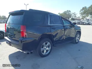2018 Chevrolet Tahoe LT with VIN 1GNSCBKCXJR132867, listed as a IAAI auction lot 41456319 with 59,131 mi miles. Bid and sale history available at carsss.com. Image 4.