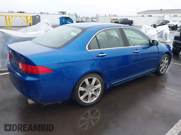 2004 Acura TSX w/Navigation with VIN JH4CL96914C021165, listed as a IAAI auction lot 41767323 with 144,071 mi miles. Bid and sale history available at carsss.com. Image 4.