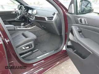 2021 BMW X5 M50i with VIN 5UXJU4C04M9G03418, listed as a IAAI auction lot 40705167 with 24,073 mi miles and . Bid and sale history available at DreamBid. Image 5.