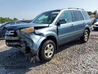 2007 Honda Pilot EX-L with VIN 5FNYF28557B044584, listed as a Copart auction lot 60083985 with 214,220 mi miles and Salvage title. Bid and sale history available at DreamBid. Image 1.