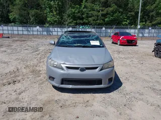 2012 Scion tC z VIN JTKJF5C70C3038591, wystawiony jako IAAI lot #42337910 z przebiegiem 191 646 mil mil oraz . Historia ofert i sprzedaży dostępna na DreamBid. Obrazek 6.