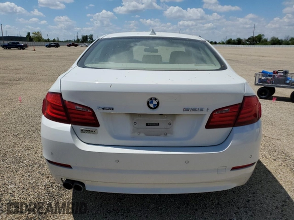 2013 BMW 5 Series 528i xDrive with VIN WBAXH5C59DD114263, listed as a Copart auction lot 56780425 with 128,317 mi miles and Clean title. Bid and sale history available at DreamBid. Image 6.