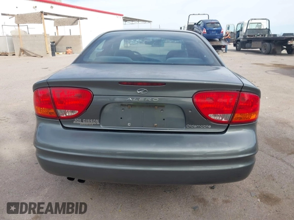 2004 Oldsmobile Alero GL1 z VIN 1G3NL52F84C124744, wystawiony jako IAAI lot #41916407 z przebiegiem 164 660 mil mil oraz . Historia ofert i sprzedaży dostępna na DreamBid. Obrazek 16.