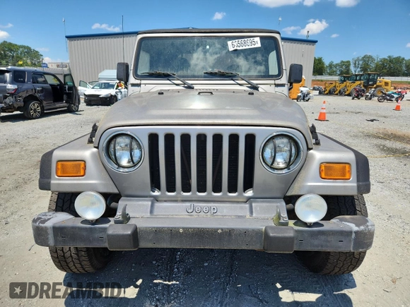 2001 Jeep Wrangler Sport with VIN 1J4FA49S21P374356, listed as a Copart auction lot 63568695 with 202,853 mi miles and Clean title. Bid and sale history available at DreamBid. Image 5.