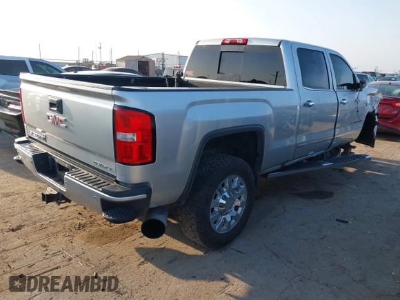 2017 GMC Sierra 2500HD Denali with VIN 1GT12UEY2HF192132, listed as a IAAI auction lot 42094570 with 119,361 mi miles and . Bid and sale history available at DreamBid. Image 4.