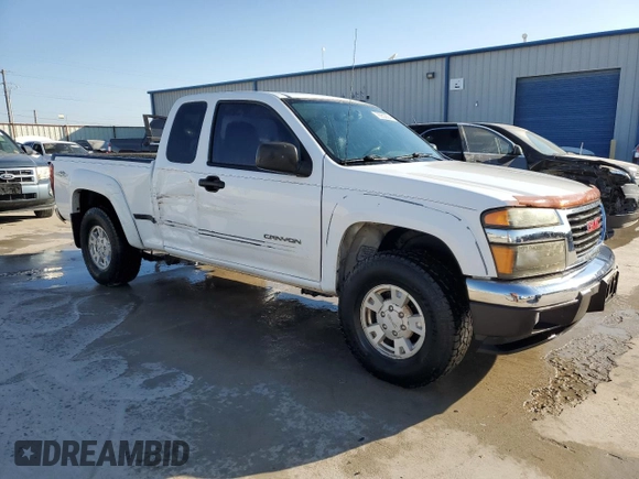 2004 GMC Canyon SLE Z71 with VIN 1GTDS196648166961, listed as a Copart auction lot 76952294 with 189,796 mi miles and Salvage Title. Bid and sale history available at carsss.com. Image 4.