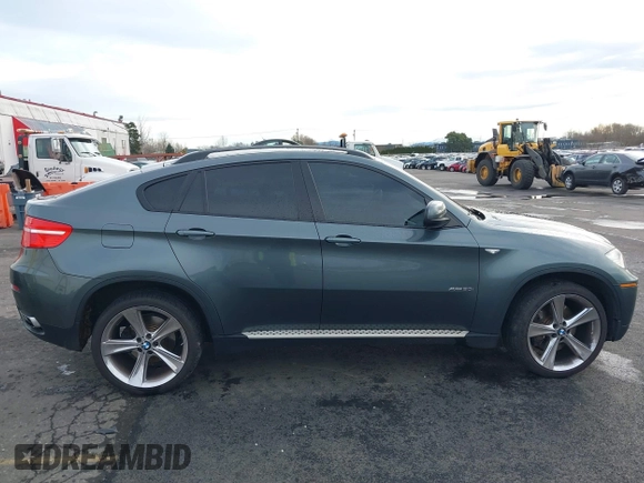 2009 BMW X6 z VIN 5UXFG83559LZ94179, wystawiony jako IAAI lot #41117261 z przebiegiem 108 997 mil mil oraz . Historia ofert i sprzedaży dostępna na DreamBid. Obrazek 13.