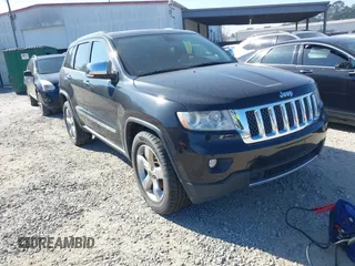 2013 Jeep Grand Cherokee Overland with VIN 1C4RJECG7DC644822, listed as a IAAI auction lot 41658872 with 156,838 mi miles. Bid and sale history available at carsss.com. Image 1.