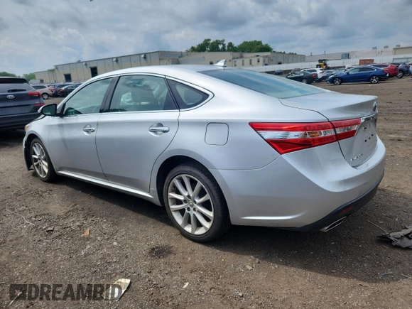 2013 Toyota Avalon XLE with VIN 4T1BK1EB6DU015373, listed as a Copart auction lot 63581345 with 134,362 mi miles and Salvage title. Bid and sale history available at DreamBid. Image 2.