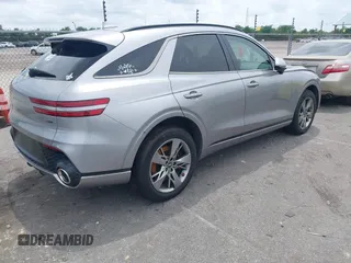 2023 Genesis GV70 Sport z VIN KMUMCDTC9PU093915, wystawiony jako IAAI lot #42147430 z przebiegiem 40 349 mil mil oraz . Historia ofert i sprzedaży dostępna na DreamBid. Obrazek 4.