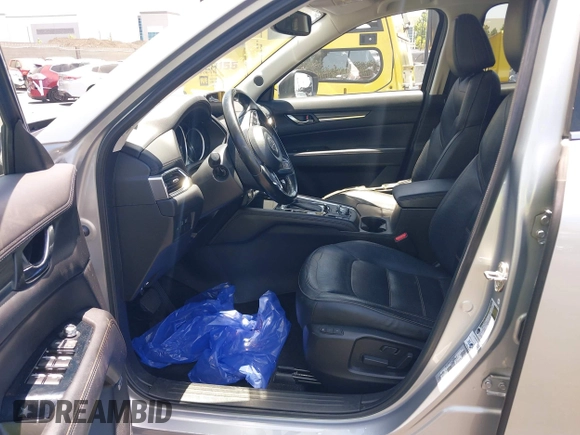 2018 Mazda CX-5 Grand Touring with VIN JM3KFBDM3J0343782, listed as a IAAI auction lot 42527044 with 60,180 mi miles and . Bid and sale history available at DreamBid. Image 5.