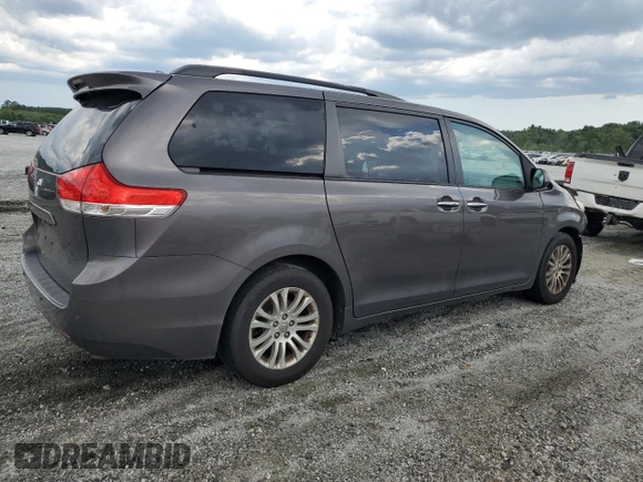 2012 Toyota Sienna XLE AAS with VIN 5TDYK3DC0CS251735, listed as a Copart auction lot 62208805 with 217,504 mi miles and Clean title. Bid and sale history available at DreamBid. Image 3.