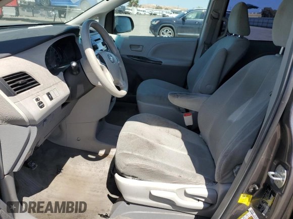 2012 Toyota Sienna с VIN 5TDZK3DC0CS190388, выставлен на аукционе Copart как лот 58564315 с пробегом 256 936 миль миль и Списание • Salvage title. История ставок и продаж доступна на DreamBid. Изображение 7.
