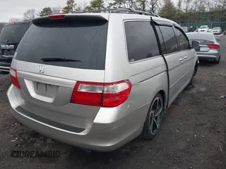 2005 Honda Odyssey EX-L with VIN 5FNRL38645B417008, listed as a IAAI auction lot 41870386 with Not Provided miles and . Bid and sale history available at carsss.com. Image 4.