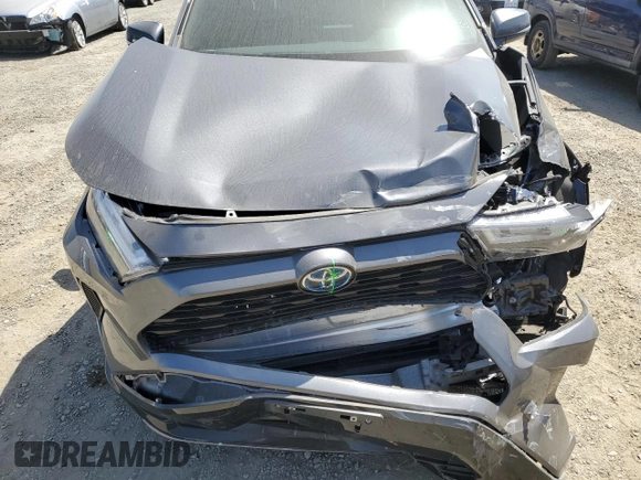 2022 Toyota RAV4 Hybrid SE with VIN 4T3T6RFV1NU068605, listed as a Copart auction lot 53846785 with 51,627 mi miles and Salvage title. Bid and sale history available at DreamBid. Image 12.