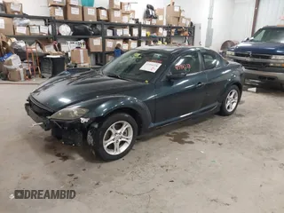 2004 Mazda RX-8 with VIN JM1FE17N840117818, listed as a IAAI auction lot 41594278 with 112,392 mi miles. Bid and sale history available at carsss.com. Image 2.