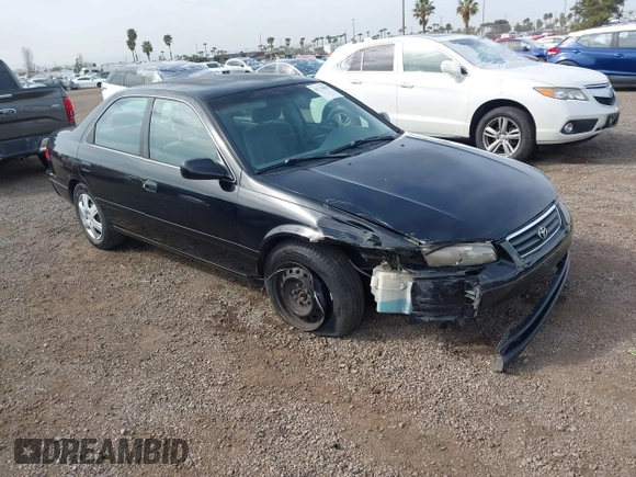 2001 Toyota Camry CE with VIN JT2BG22K910548345, listed as a IAAI auction lot 41723835 with 170,228 mi miles and . Bid and sale history available at DreamBid. Image 1.