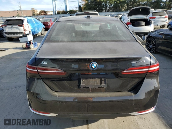 2024 BMW i5 eDrive40 with VIN WBY33FK06RCR89436, listed as a Copart auction lot 76718924 with 0 mi miles and Salvage Title. Bid and sale history available at carsss.com. Image 6.