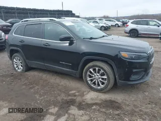 2019 Jeep Cherokee Latitude with VIN 1C4PJLCBXKD285702, listed as a IAAI auction lot 41606310 with 87,602 mi miles. Bid and sale history available at carsss.com. Image 1.