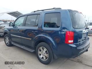 2009 Honda Pilot Touring with VIN 5FNYF48929B040199, listed as a IAAI auction lot 41466006 with 167,959 mi miles and . Bid and sale history available at carsss.com. Image 3.