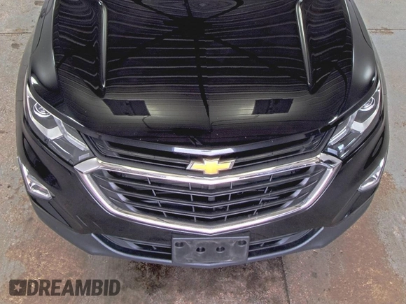 2019 Chevrolet Equinox LT z VIN 2GNAXTEV2K6259533, wystawiony jako IAAI lot #42556128 z przebiegiem 91 907 mil mil oraz . Historia ofert i sprzedaży dostępna na DreamBid. Obrazek 21.