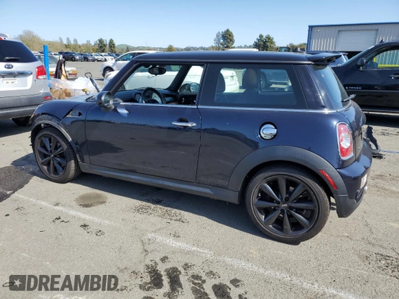2013 MINI Hardtop S with VIN WMWSV3C5XDT396202, listed as a Copart auction lot 52175055 with 50,701 mi miles and Salvage Title. Bid and sale history available at DreamBid. Image 2.