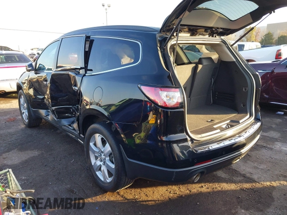 2016 Chevrolet Traverse LTZ z VIN 1GNKRJKD3GJ245438, wystawiony jako IAAI lot #41010372 z przebiegiem 115 264 mil mil oraz . Historia ofert i sprzedaży dostępna na DreamBid. Obrazek 3.