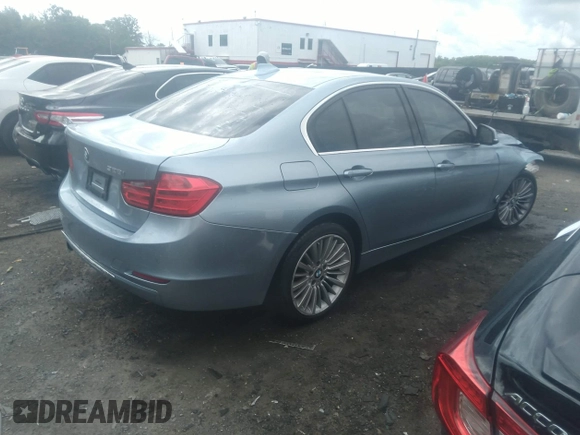 2013 BMW 3 Series 328i with VIN WBA3A5G54DNP25843, listed as a IAAI auction lot 39515836 with 104,045 mi miles. Bid and sale history available at carsss.com. Image 4.