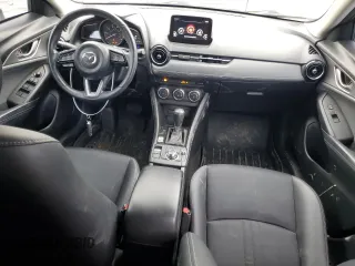 2019 Mazda CX-3 Touring with VIN JM1DKFC78K0405131, listed as a Copart auction lot 87065614 with 91,091 mi miles and Salvage Title. Bid and sale history available at carsss.com. Image 8.