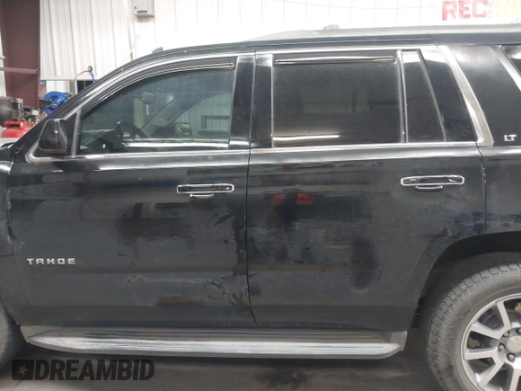 2015 Chevrolet Tahoe LT z VIN 1GNSCBKC1FR228488, wystawiony jako IAAI lot #41933869 z przebiegiem 164 523 mil mil oraz . Historia ofert i sprzedaży dostępna na DreamBid. Obrazek 15.
