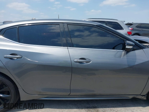 2020 Nissan Maxima SR with VIN 1N4AA6EVXLC383592, listed as a IAAI auction lot 42058071 with 103,014 mi miles and . Bid and sale history available at DreamBid. Image 13.