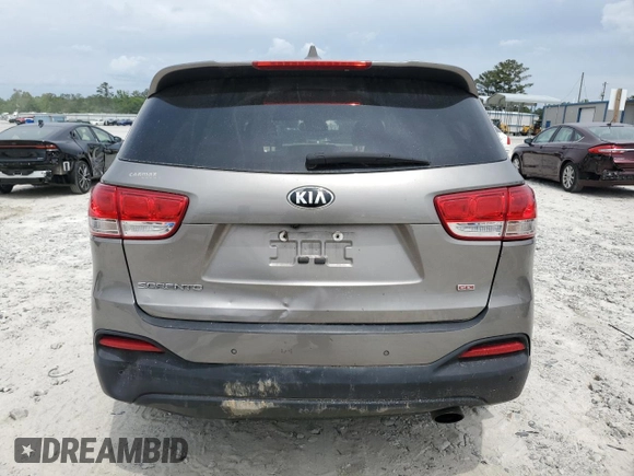 2018 Kia Sorento LX z VIN 5XYPG4A31JG406679, wystawiony jako Copart lot #55087315 z przebiegiem 146 171 mil mil oraz Szkoda całkowita • Salvage title. Historia ofert i sprzedaży dostępna na DreamBid. Obrazek 6.