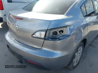 2010 Mazda 3 i SV with VIN JM1BL1SF4A1148543, listed as a IAAI auction lot 40110323 with 131,801 mi miles and . Bid and sale history available at DreamBid. Image 13.