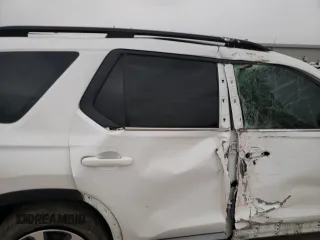 2023 Honda Pilot Elite z VIN 5FNYG1H81PB045653, wystawiony jako Copart lot #51252065 z przebiegiem 57 388 mil mil oraz Szkoda całkowita • Salvage title. Historia ofert i sprzedaży dostępna na DreamBid. Obrazek 11.