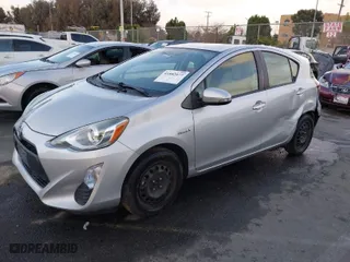 2016 Toyota Prius c One with VIN JTDKDTB39G1123855, listed as a IAAI auction lot 41882077 with 145,830 mi miles. Bid and sale history available at carsss.com. Image 2.