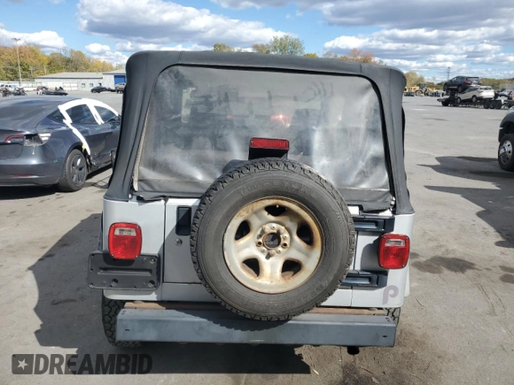 2006 Jeep Wrangler SE with VIN 1J4FA29166P739480, listed as a Copart auction lot 76320934 with 139,542 mi miles and Salvage Title. Bid and sale history available at carsss.com. Image 6.