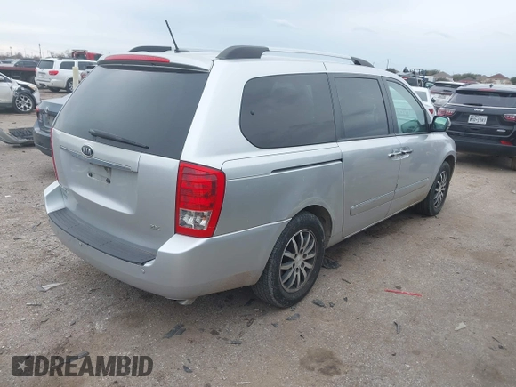 2012 Kia Sedona EX with VIN KNDMH4C74C6497243, listed as a IAAI auction lot 41368080 with 218,806 mi miles. Bid and sale history available at carsss.com. Image 4.