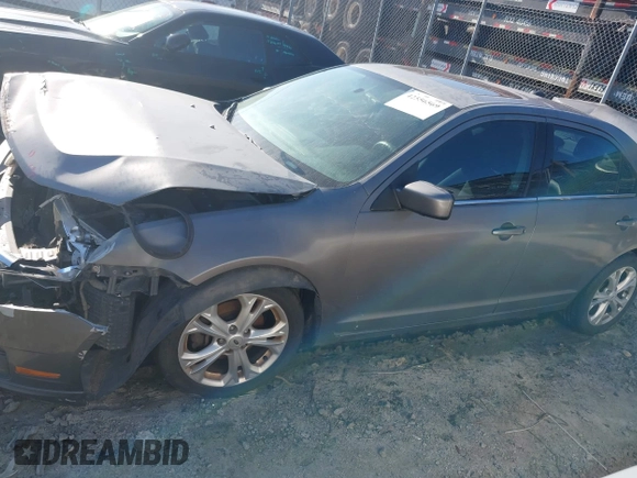 2012 Ford Fusion SE with VIN 3FAHP0HA9CR428400, listed as a IAAI auction lot 42556569 with 205,285 mi miles and . Bid and sale history available at DreamBid. Image 14.